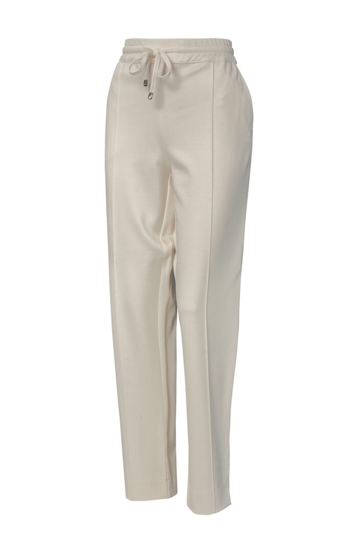 Damskie zwężane spodnie w kolorze waniliowym