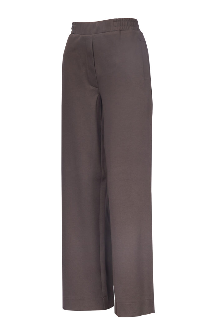 Eleganckie spodnie damskie z szerokimi nogawkami i gumką w pasie dostępne w kolorze czarnym, granatowym i brązowym od Jumitex.